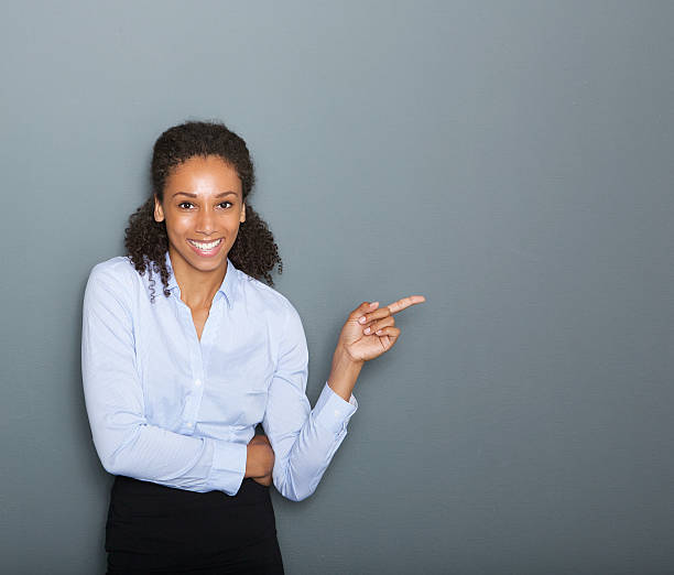 istock Confident business woman pointing finger 512135439