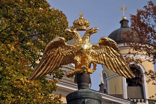 The double-headed eagle on the gun barrel. Transfiguration Cathedral , Saint Petersburg