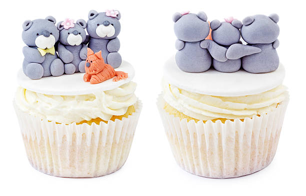 istock Cupcake with teddy bear family isolated 512145252
