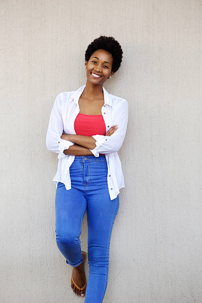 istock Beautiful young woman standing confidently 512145340