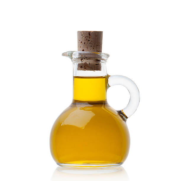 istock Olive oil in closed glass bottle 512145682