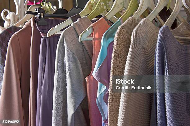 Knitted Homemade Clothes Of Different Colors Hanging In The Store Stock Photo - Download Image Now