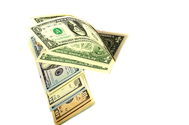 istock Dollars of different denominations on white background. 512146774