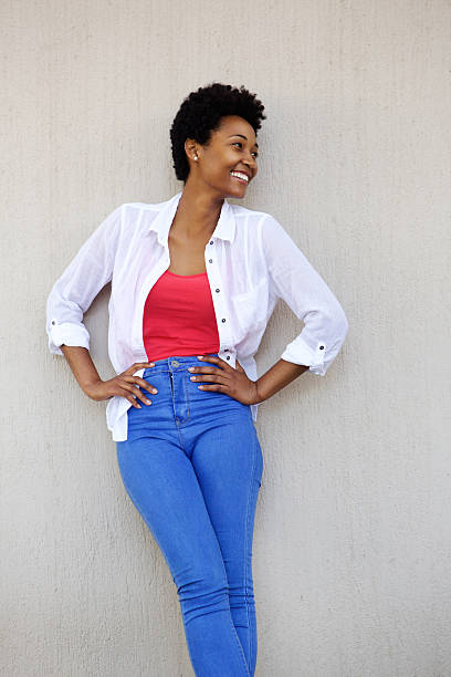 istock Stylish young african woman looking at copy space 512147290