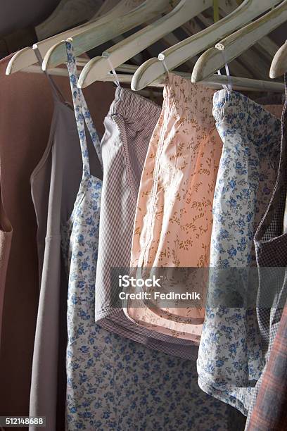 Homemade Clothes Of Different Colors Hanging In The Store Stock Photo - Download Image Now