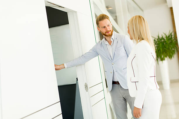 istock Young modern businesspeople in the office 512149934