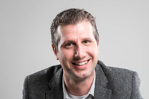 istock attractive businessman portrait looking happy at camera 512150292
