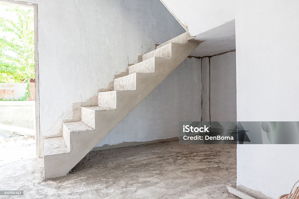 unfinished stairs in an building in an building, there is an unfinished stairs Below Stock Photo