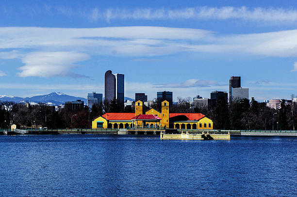 Downtown Denver with Rocky Mountains from City Park stock photo