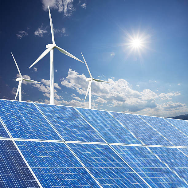 istock Wind turbines and solar panels. Green energy 512150969