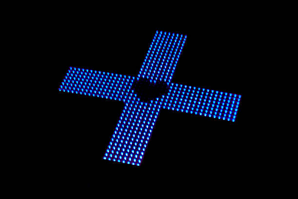 istock Defocused blue neon cross on black background 512152706