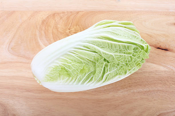 istock chinese cabbage on wooden chopping board prepare cooking 512152865