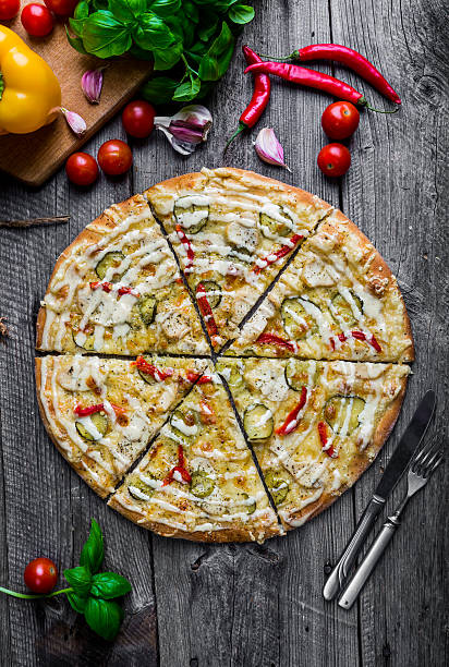 istock Pizza with chicken, pickled cucumber, pickled peppers and mayonnaise 512153490