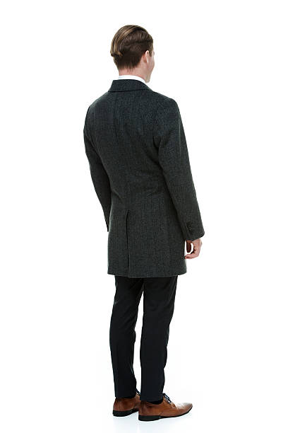 istock Rear view of businessman standing & looking away 512154115