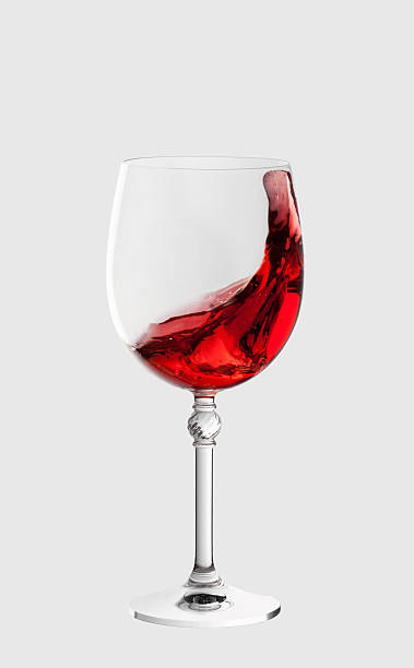 istock wine glass with splash of wine 512155425