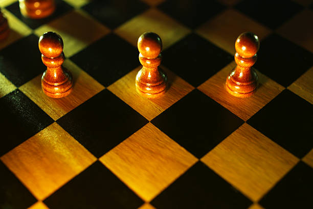 Three Chess Pawns Stock Photo - Download Image Now - Chess Board, High  Angle View, Chess Piece - iStock