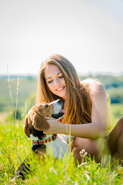 istock Teenager with her dog 512157145
