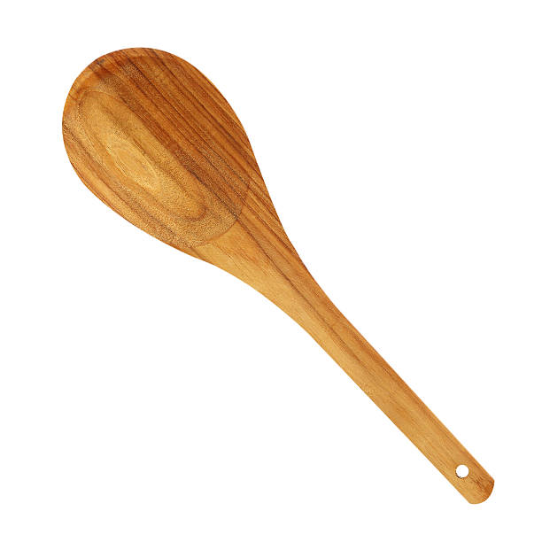 istock wooden kitchen spoons on white background 512157546