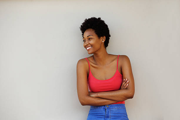 istock Attractive young african woman looking at copy space 512157882
