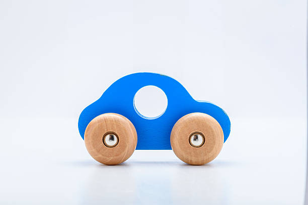 Blue Wooden Toy Car Blue Wooden Toy Car on White Background wooden car stock pictures, royalty-free photos & images