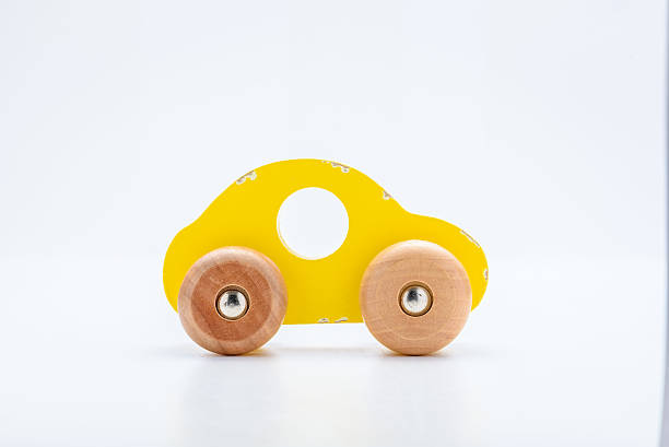 istock Yellow wooden toy car 512159098