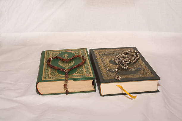 istock Koran and rosary on white background 512159134