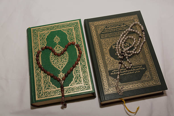 istock Koran and rosary on white background 512159168