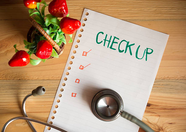 istock top view of paper list and Stethoscope on wood table 512161296