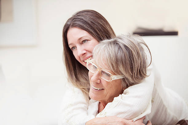 Happy senior mother and daughter portrait stock photo