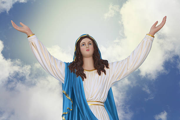 istock statue of madonna on the blue sky 512163302