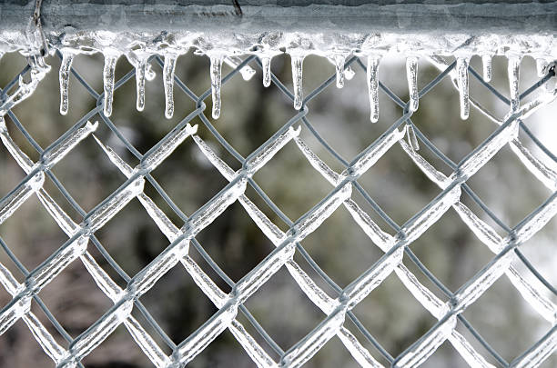 istock Close up on chain link fence after icy rain storm 512164654