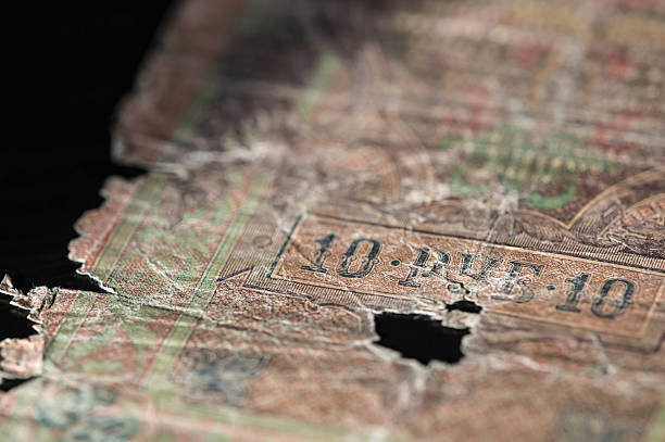 istock Old banknote of ten Russian rubles 1909 close up 512167202