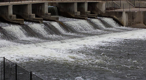 istock Water Flowing out of Dam 512171572