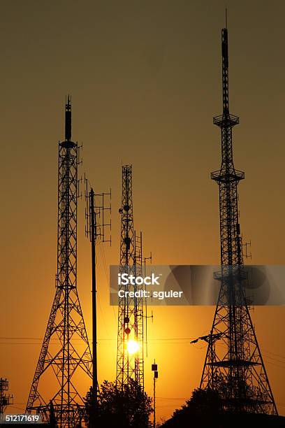 Telecommunication Towers Stock Photo - Download Image Now - Antenna - Aerial, Back Lit, Broadcasting