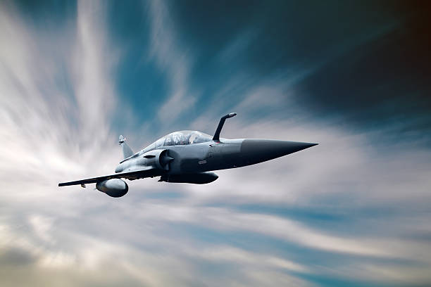 istock Military airplan on the speed in the sky 512171637