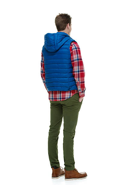 istock Rear view of hipster standing & looking away 512172047