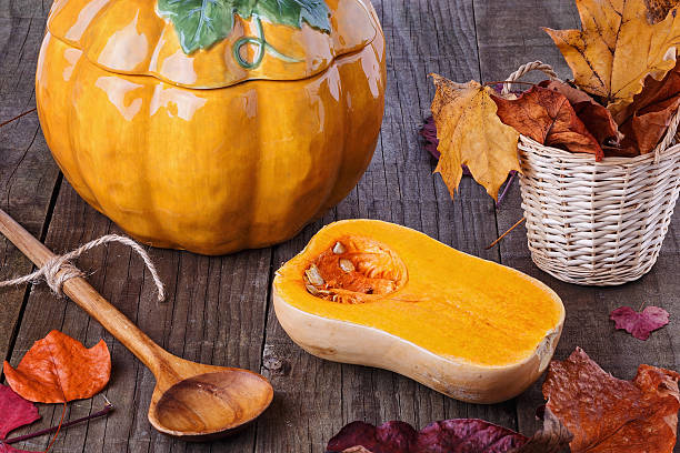 istock Fall still life with pumpkin and pumpkin shaped pot 512172648