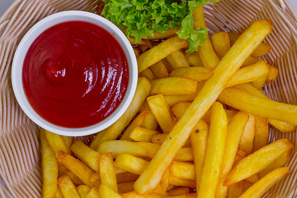 istock Fresh fried french fries with ketchup 512172814