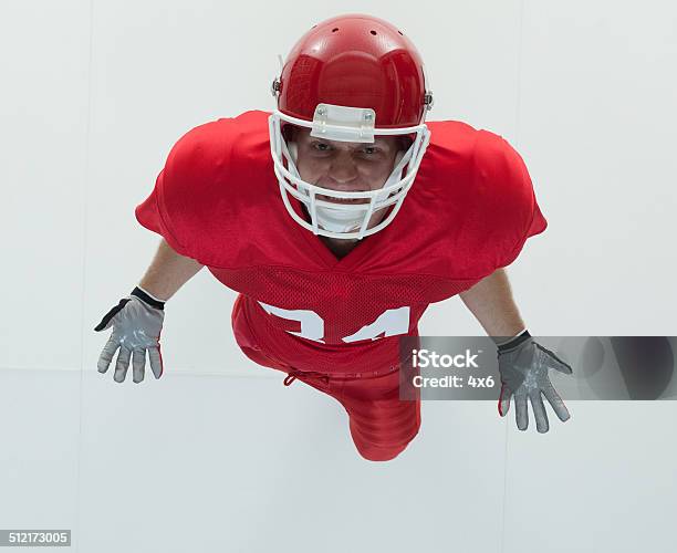 Above View Of American Football Player Cheering Stock Photo - Download Image Now - 20-29 Years, Activity, Adult