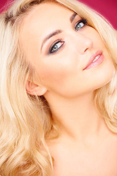 istock Seductive beautiful young blond woman 512173051