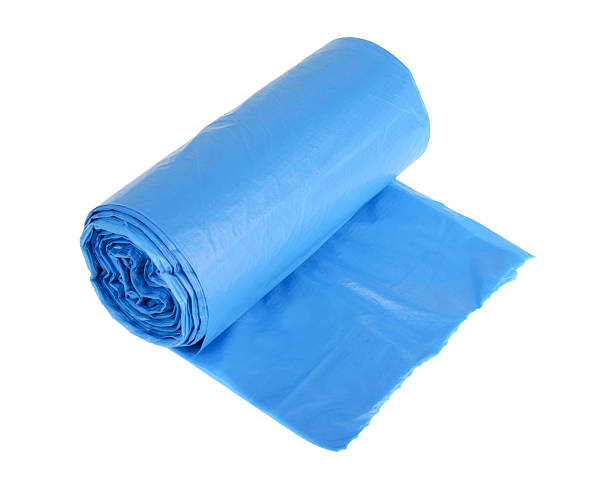 istock Roll of plastic garbage bags isolated on white 512173875