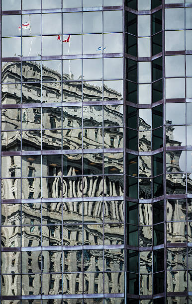 Building reflection on skyscraper windows Building reflection on skyscraper windows exterior dorchester on thames stock pictures, royalty-free photos & images