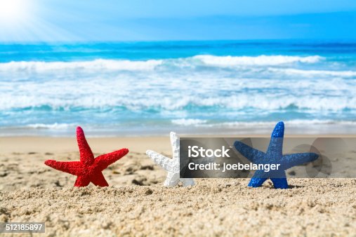 istock Starfish on beach during July fourth 512185897