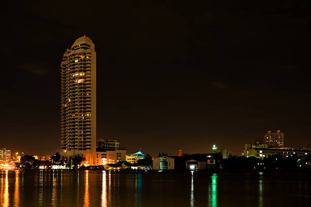 istock Riverside buildings at night in Bangkok, Thailand. 512186225