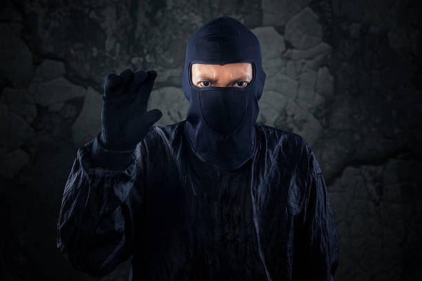 istock Bandit showing hand to take something 1 512186227