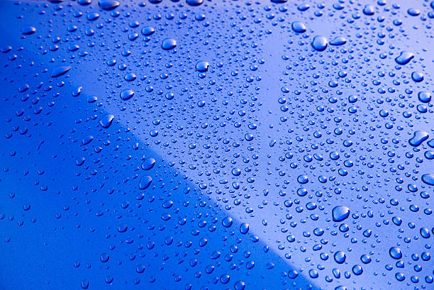 water drops on blue background stock photo