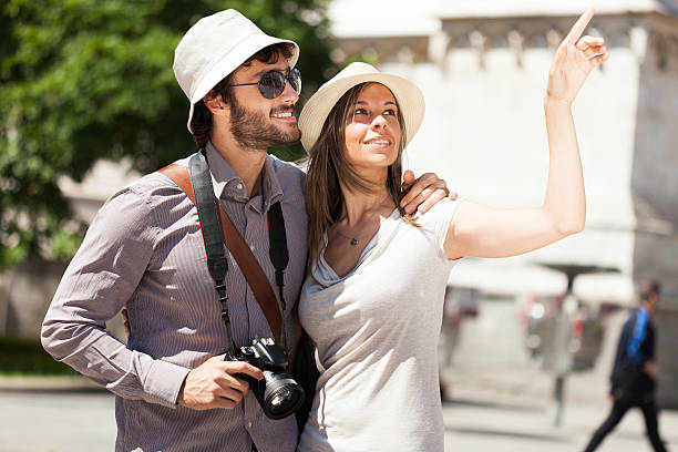 istock Tourists walking in a city 512187273