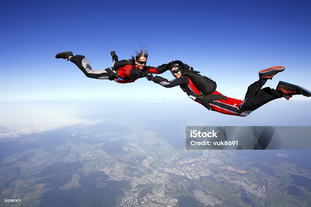 Freefall Two skydivers enjoy in free fall Skydiving Stock Photo