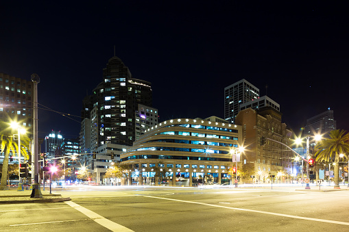 city road with cityscape of San Francisco at night