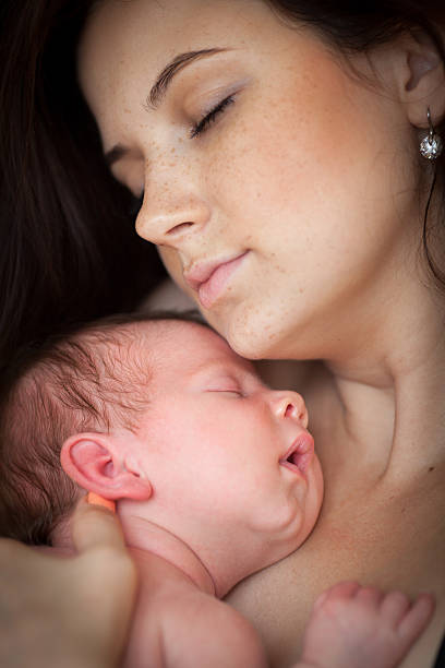 istock Young mother and her sleeping baby 512201410